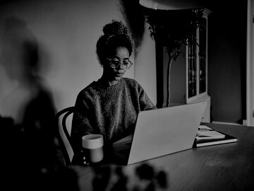 Woman writing at a desk